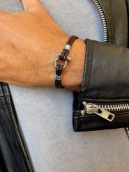 Uomo Skórzana bransoletka w kolorze brązowym rozmiar: onesize. Brązowe biżuteria dla mężczyzn Uomo, ze stali. Za 70.24 zł.