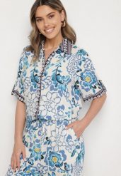 Niebieska Koszula z Wiskozy w Kwiatowy Wzór Milineira. Niebieskie koszule damskie Born2be, l, bez wzorów, z jeansu, eleganckie, bez kołnierzyka, bez ramiączek. Za 79.99 zł.