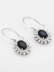 CARATELLI Złote kolczyki "Stellaire" z diamentami rozmiar: onesize. Niebieskie kolczyki damskie CARATELLI, z diamentem, złote, z zapięciem typu bigiel. Za 2,125.48 zł.