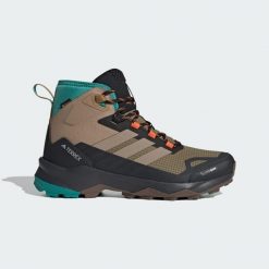 Buty trekkingowe Terrex Skychaser AX5 Mid GORE-TEX CLIMAWARM+. Brązowe buty trekkingowe męskie Adidas, z gore-texu, bez zapięcia, wspinaczkowe, climawarm (adidas). Za 699.00 zł.