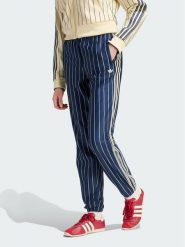 Adidas Spodnie dresowe Pinstripe Firebird Track Pant KR7037 Granatowy Regular Fit. Niebieskie spodnie dresowe damskie Adidas, xs, bez wzorów, z dresówki. Za 359.99 zł.