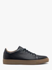 Granatowe buty typu trampki DANIEL. Niebieskie trampki i tenisówki męskie Ryłko, bez wzorów, ze skóry, bez zapięcia. Za 449.99 zł.