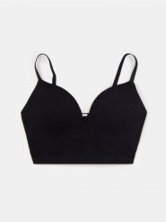 Usztywniany biustonosz bezszwowy - czarny. Czarne biustonosze Sinsay, bez wzorów. Za 25.99 zł.