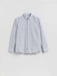 Strukturalna koszula regular fit - jasnoniebieski. Niebieskie koszule męskie Reserved, l, bez wzorów, z bawełny, bez kołnierzyka, bez ramiączek. Za 139.99 zł.