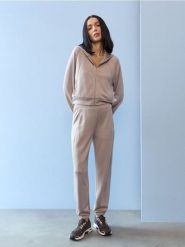 Spodnie jogger z domieszką wiskozy i przeszyciami - kremowy. Białe spodnie materiałowe damskie Sinsay, bez wzorów, z wiskozy, sportowe. Za 39.99 zł.