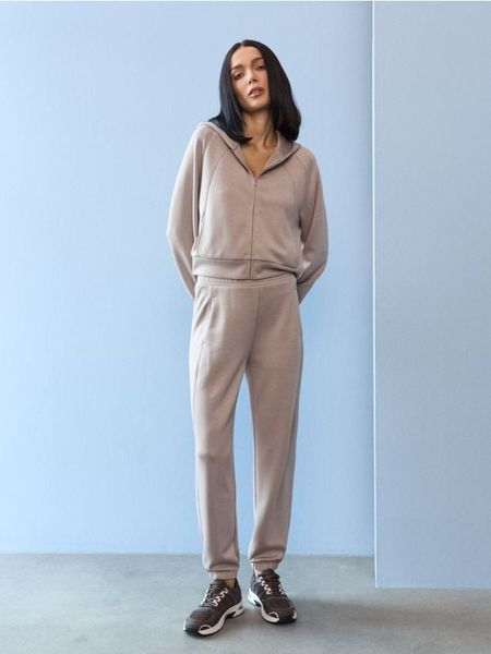 Spodnie jogger z domieszką wiskozy i przeszyciami - kremowy. Białe spodnie materiałowe damskie Sinsay, l, z wiskozy. Za 39.99 zł.