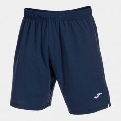 Szorty Joma Eurocopa III. Niebieskie szorty męskie Joma, bez wzorów, z materiału, sportowe. Za 149.50 zł.