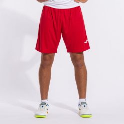 Szorty Joma Glasgow. Białe szorty męskie Joma, bez wzorów, z materiału, sportowe. W wyprzedaży za 96.05 zł.