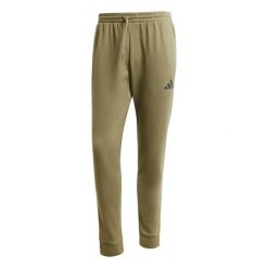 Spodnie do biegania adidas Essentials Feelcozy Fleece. Czarne spodnie materiałowe męskie Adidas, bez wzorów, z dresówki, sportowe. Za 241.50 zł.
