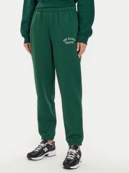 New Balance Spodnie dresowe WP43500 Zielony Relaxed Fit. Zielone spodnie dresowe damskie New Balance, m, bez wzorów, z dresówki. Za 189.99 zł.