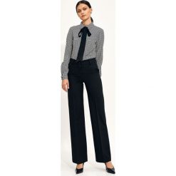Czarne Spodnie Typu Wide Leg. Czarne spodnie materiałowe damskie Nife, bez wzorów, z elastanu, z podwyższonym stanem. Za 207.90 zł.