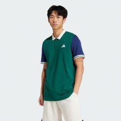 Koszulka adidas Heritage Tennis Polo. Zielone koszulki polo męskie Adidas, s, bez wzorów, bez ramiączek. W wyprzedaży za 167.40 zł.