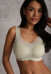 Zielony Sportowy Biustonosz z Usztywnieniem Ozdobiony Siateczkową Wstawką Edalissa. Zielone biustonosze sportowe damskie Renee, bez wzorów. Za 24.99 zł.