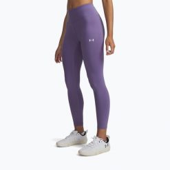 Legginsy treningowe damskie Under Armour Motion Ankle. Fioletowe legginsy damskie Under Armour, bez wzorów, na fitness i siłownię. Za 129.99 zł.