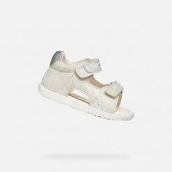 Sandały Geox Model B Sandal Macchia Gir Kolor Biały. Białe sandały damskie Geox, bez wzorów, ze skóry, bez obcasa. Za 226.99 zł.