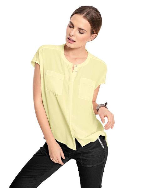 Heine Bluzka w kolorze żółtym rozmiar: 46. Żółte bluzki damskie Heine, bez wzorów, bez kołnierzyka, bez ramiączek. Za 104.99 zł.