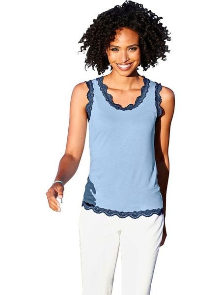 Heine Top w kolorze błękitnym rozmiar: 46. Niebieskie topy damskie Heine, bez wzorów, z koronki, bez kołnierzyka. Za 43.99 zł.