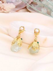 L'Atelier de Gaia Pozłacane kolczyki-wkrętki z perłami i cyrkoniami rozmiar: onesize. Zielone kolczyki damskie L'Atelier de Gaia, z cyrkonią, pozłacane, z zapięciem typu bigiel. Za 56.99 zł.