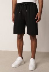 Czarne Szorty Dresowe z Bawełną i Sznurkami Leofiel. Czarne szorty męskie Born2be, z bawełny, bez kołnierzyka. Za 59.99 zł.