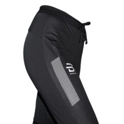 Spodnie do biegania Daehlie Sportswear Winter Run. Czarne spodnie materiałowe męskie DAEHLIE, bez wzorów, z elastanu. Za 508.50 zł.