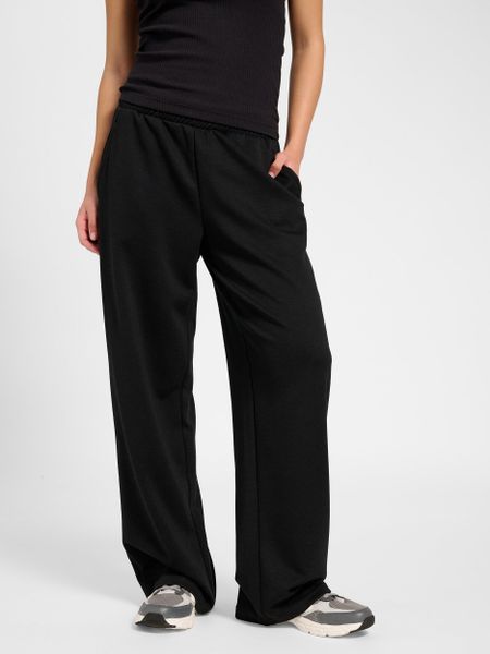 Damskie spodnie dresowe Hummel Soft. Czarne spodnie sportowe damskie HUMMEL, m, z dresówki, na fitness i siłownię. Za 228.50 zł.