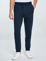 BIG STAR Spodnie dresowe "Wladorp" w kolorze granatowym rozmiar: M. Niebieskie spodnie dresowe męskie Big Star, bez wzorów, z dresówki. Za 102.99 zł.