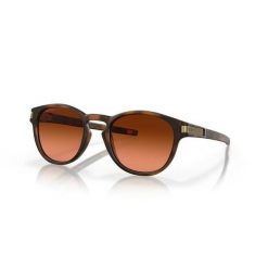 Okulary przeciwsłoneczne Oakley Latch. Brązowe okulary przeciwsłoneczne damskie Oakley, okrągłe. Za 735.90 zł.