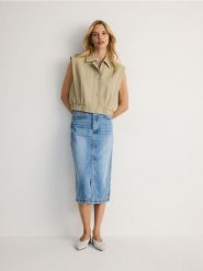 Kamizelka z bawełną i lyocellem - jasnozielony. Zielone kamizelki damskie Reserved, l, z bawełny. W wyprzedaży za 89.99 zł.