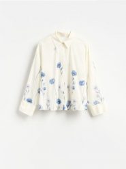 Bawełniana koszula w kwiaty - złamana biel. Koszule damskie Reserved, l, bez wzorów, z bawełny, bez kołnierzyka, bez ramiączek. Za 139.99 zł.
