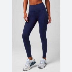 Damskie legginsy Fabletics On-The-Go. Niebieskie legginsy damskie FABLETICS, bez wzorów. Za 327.25 zł.