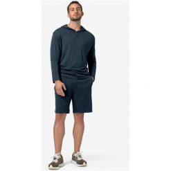 Spodenki dresowe męskie SUPER.NATURAL Solution Shorts. Niebieskie szorty męskie Super.natural, z dresówki, bez kołnierzyka. Za 430.00 zł.