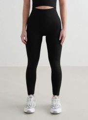 Damskie legginsy bezszwowe, wysoki stan, squat proof petite Shape czarny. Czarne legginsy damskie Aim'n, s, bez wzorów, z elastanu. Za 296.00 zł.