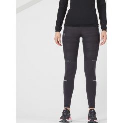 Legginsy do biegania damskie Kiprun Warm Rain ocieplane. Czarne legginsy damskie KIPRUN, xs, bez wzorów, z elastanu. Za 189.99 zł.