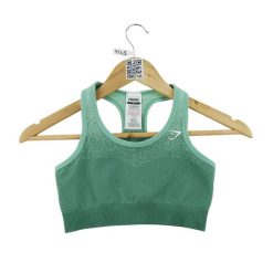Second life - Biustonosz sportowy damski Gymshark na bieganie zielony - Jak nowy. Zielone biustonosze sportowe damskie Gymshark, bez wzorów, z tkaniny. Za 85.16 zł.