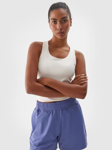 4F Top treningowy szybkoschnący damski - beżowy XS. Brązowe topy damskie 4f, xs, bez wzorów, z dzianiny, bez ramiączek. W wyprzedaży za 59.99 zł.