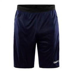 Spodenki treningowe męskie Craft Evolve Zip Pocket. Niebieskie spodnie dresowe męskie Craft, z dresówki, bez kołnierzyka. Za 239.00 zł.