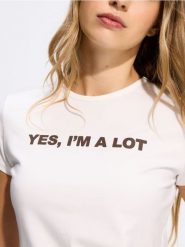 T-shirt z nadrukiem - biały. Białe t-shirty damskie Reserved, l, bez wzorów, z bawełny, bez kołnierzyka. Za 49.99 zł.