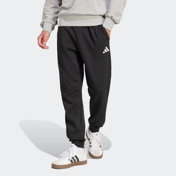 Second Life - Spodnie dresowe męskie ADIDAS Essentials Feelcozy - Stan Dobry. Czarne spodnie sportowe męskie Adidas, z bawełny. Za 164.99 zł.
