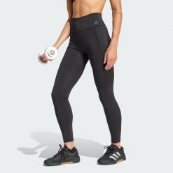 Legginsy treningowe Optime Workout Full Length. Czarne bielizna termoaktywna damska Adidas, bez wzorów, ze skóry. Za 259.00 zł.