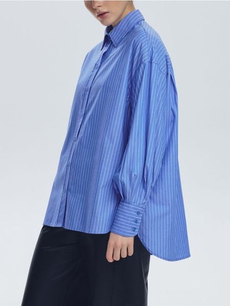 Koszula w paski - niebieski. Niebieskie koszule damskie Reserved, l, bez wzorów, z bawełny, bez kołnierzyka, bez ramiączek. Za 139.99 zł.