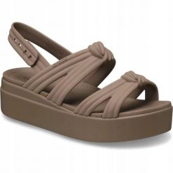 Sandały Dla Dorosłych Crocs Brooklyn Knot Low Wedge Sandal. Brązowe sandały damskie Crocs, bez wzorów, z materiału, bez obcasa, na koturnie. Za 289.99 zł.