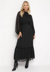 Czarna Rozkloszowana Sukienka Maxi z Falbanką Kamiva. Czarne sukienki damskie Born2be, s, z aplikacjami, bez kołnierzyka, bez ramiączek, maxi, rozkloszowane. W wyprzedaży za 159.99 zł.