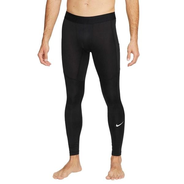 Męskie Spodnie Termiczne Pro. Szare spodnie materiałowe męskie Nike, bez wzorów, z materiału. Za 212.99 zł.
