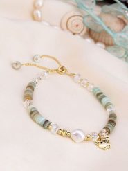 Pierres de Jade Pozłacana bransoletka z perłami i agatami rozmiar: onesize. Zielone bransoletki damskie Pierres de Jade, pozłacane. Za 56.99 zł.