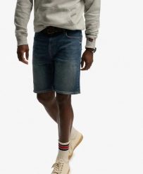 Superdry Vintage Straight Shorts denim Yokohama Dark Blue. Niebieskie szorty męskie Superdry., bez wzorów, z bawełny, klasyczne. Za 251.00 zł.