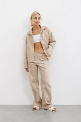 SPODNIE KAREN BEŻOWE M - Flawless. Brązowe spodnie materiałowe damskie Flawless, bez wzorów, z bawełny, eleganckie. Za 252.00 zł.