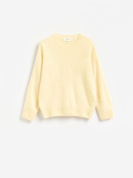 Wełniany sweter z domieszką kaszmiru - jasnożółty. Żółte swetry klasyczne damskie Reserved, l, z kaszmiru, bez kołnierzyka. Za 299.99 zł.