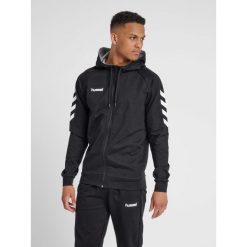 Bluza z kapturem sportowa męska Hummel Go Cotton Zip Hoodie. Czarne bluzy sportowe męskie HUMMEL, bez wzorów, sportowe, bez kołnierzyka, bez ramiączek. W wyprzedaży za 151.75 zł.