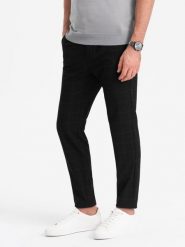 Spodnie męskie o klasycznym kroju w delikatną kratę - czarne V5 OM-PACP-0187 - XXL. Czarne spodnie materiałowe męskie Ombre Clothing, bez wzorów, z materiału, klasyczne. Za 143.99 zł.