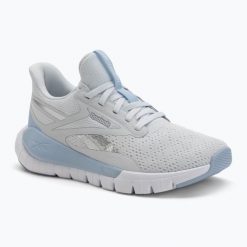 Buty Reebok Reebok Flex Trainer moon/Y2K. Białe obuwie treningowe damskie REEBOK FITNESS, na fitness i siłownię. Za 299.99 zł.